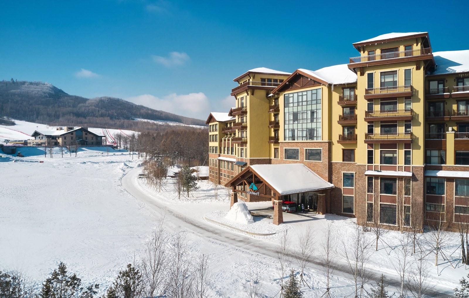 Club Med Changbaishan beside snow-covered terrain