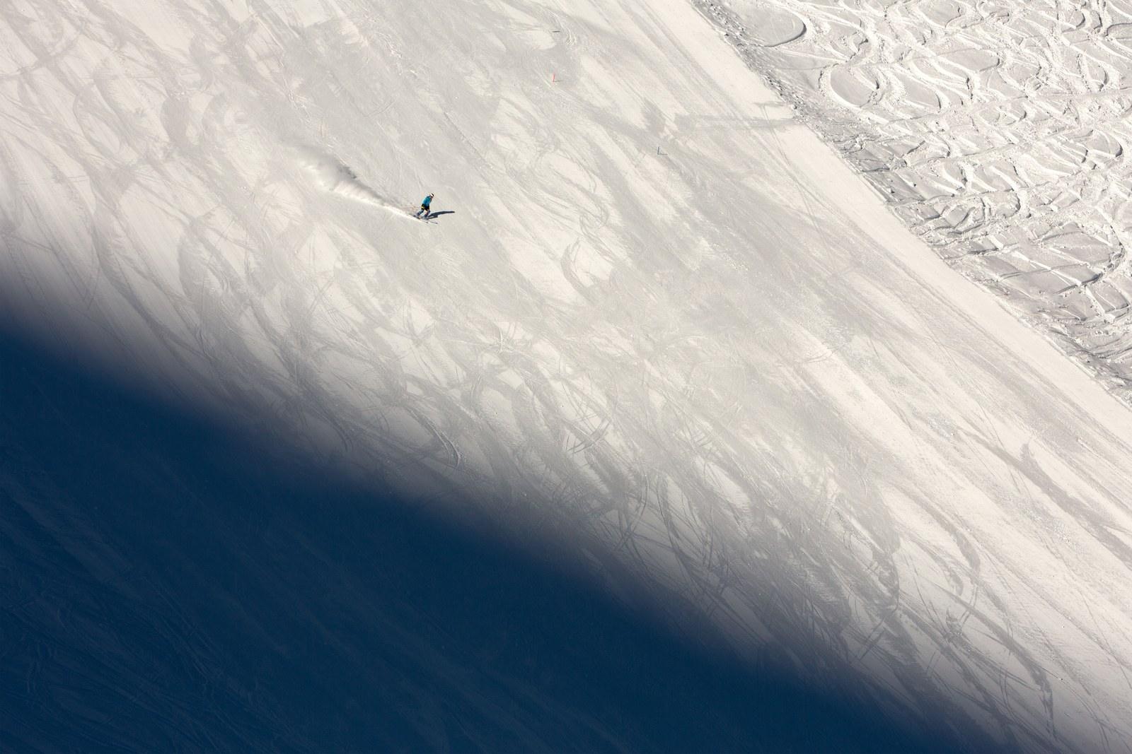 Skier on a snow-covered slope at Tignes