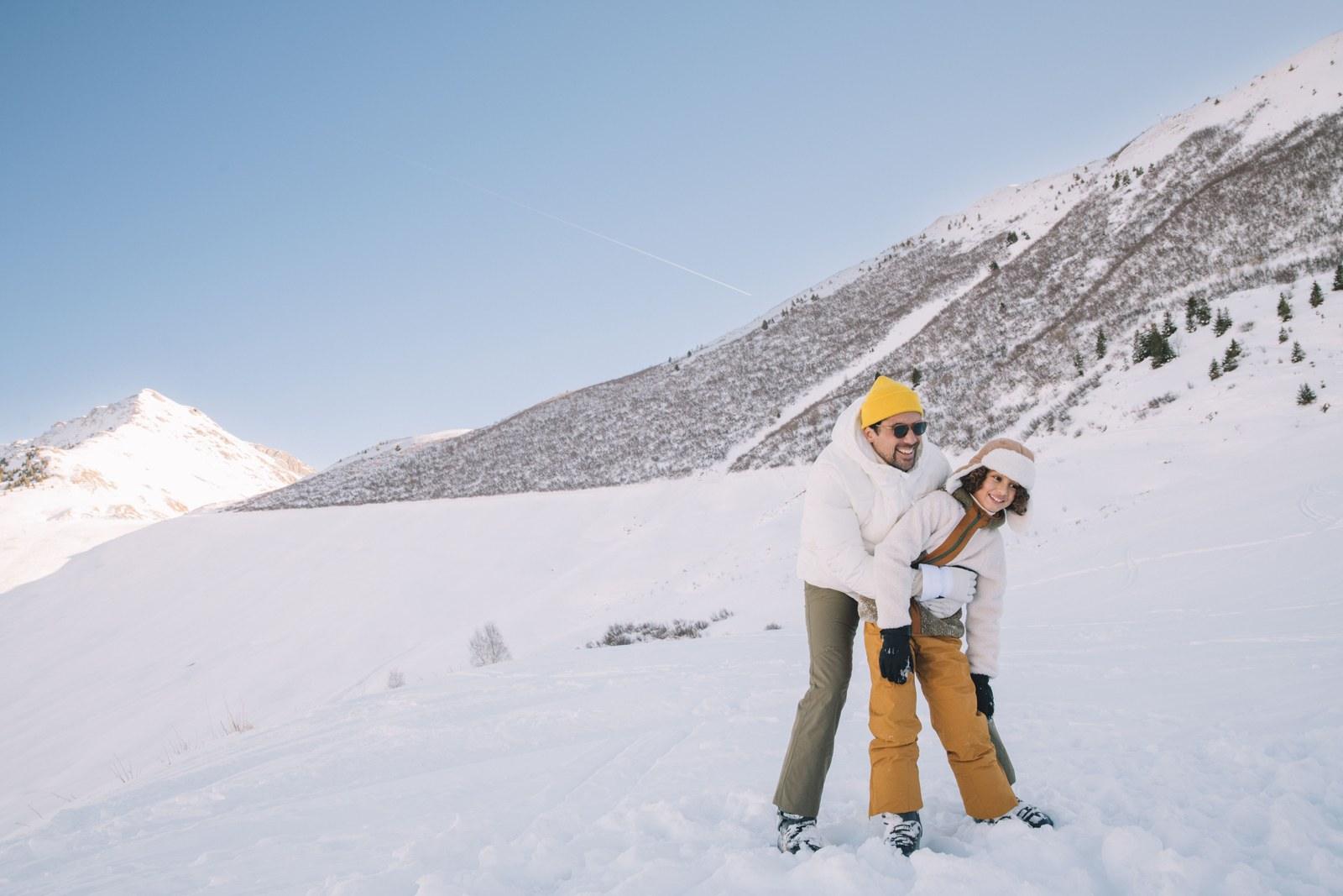 Father and child enjoying the snow at Valmorel