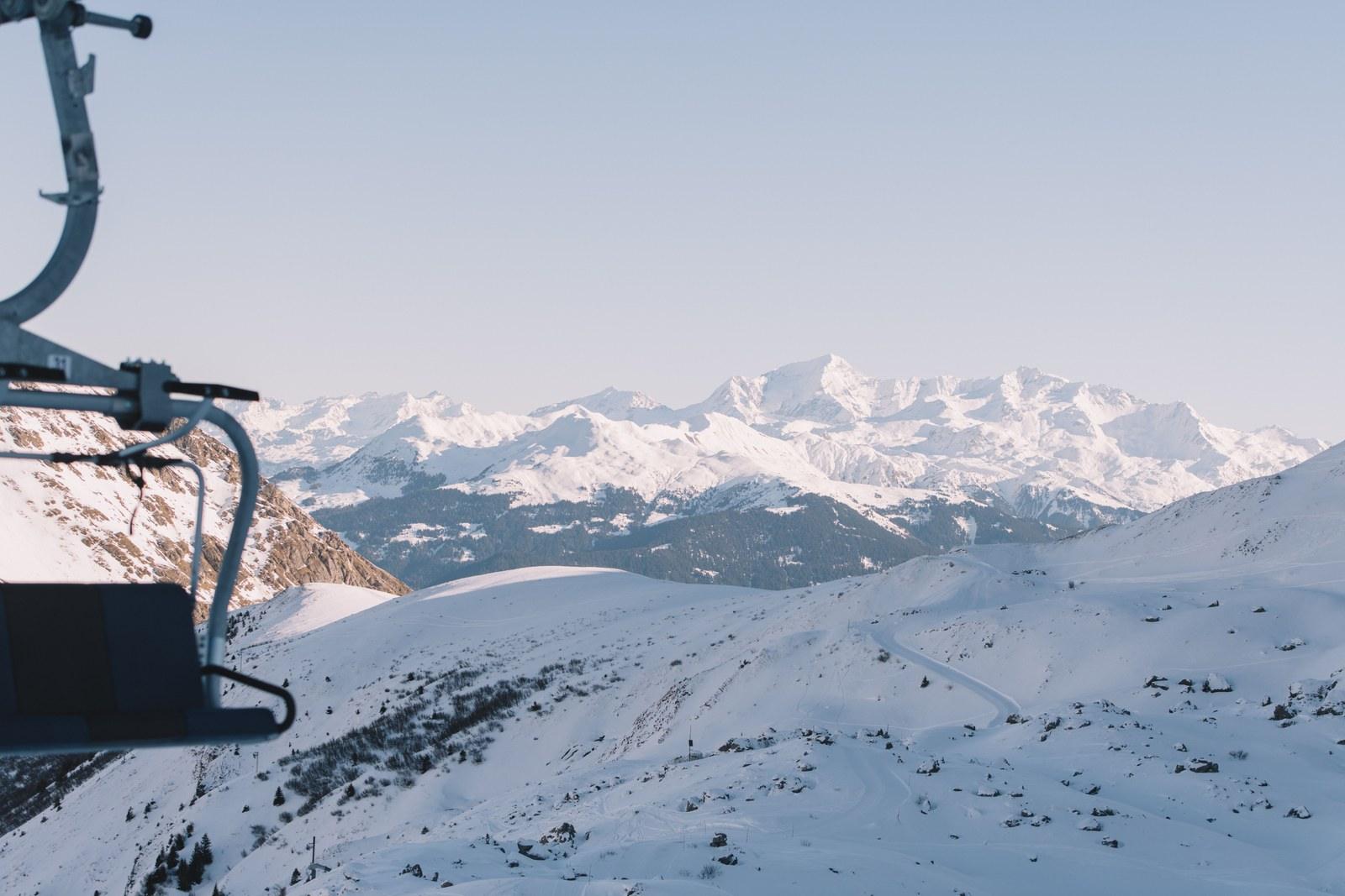 Snow-covered Valmorel ski terrain viewed from a chairlift