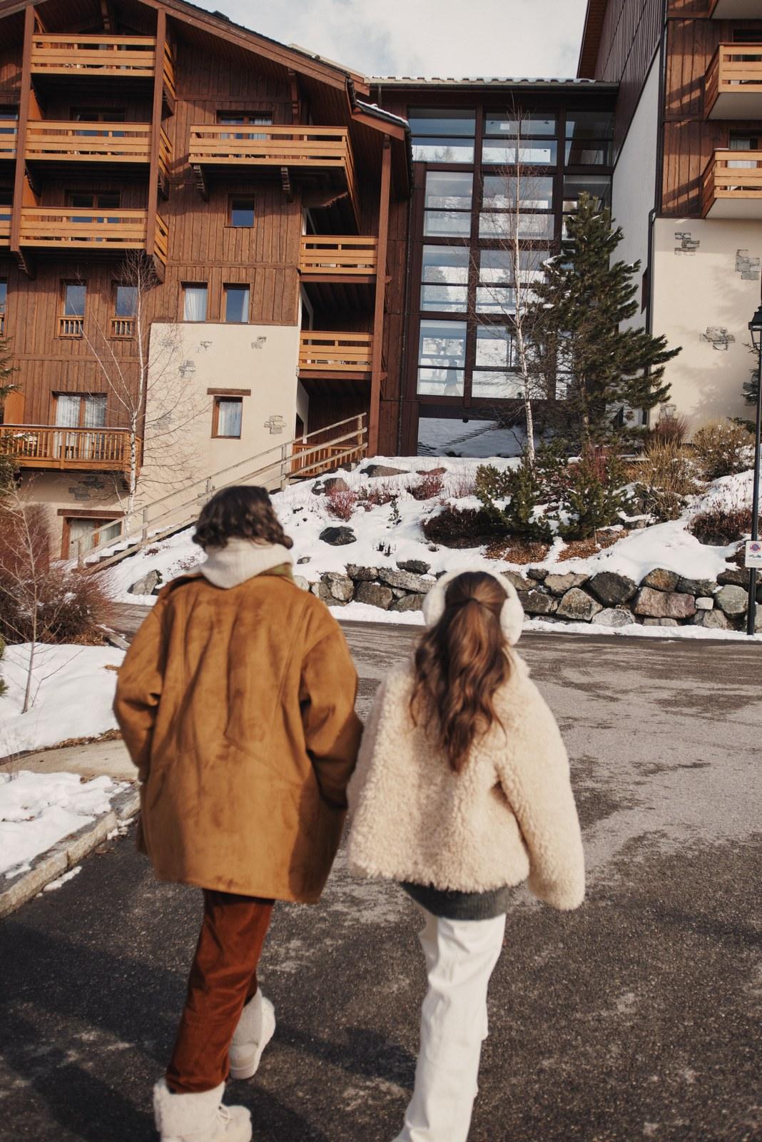 Guests approaching Club Med Peisey-Vallandry in winter