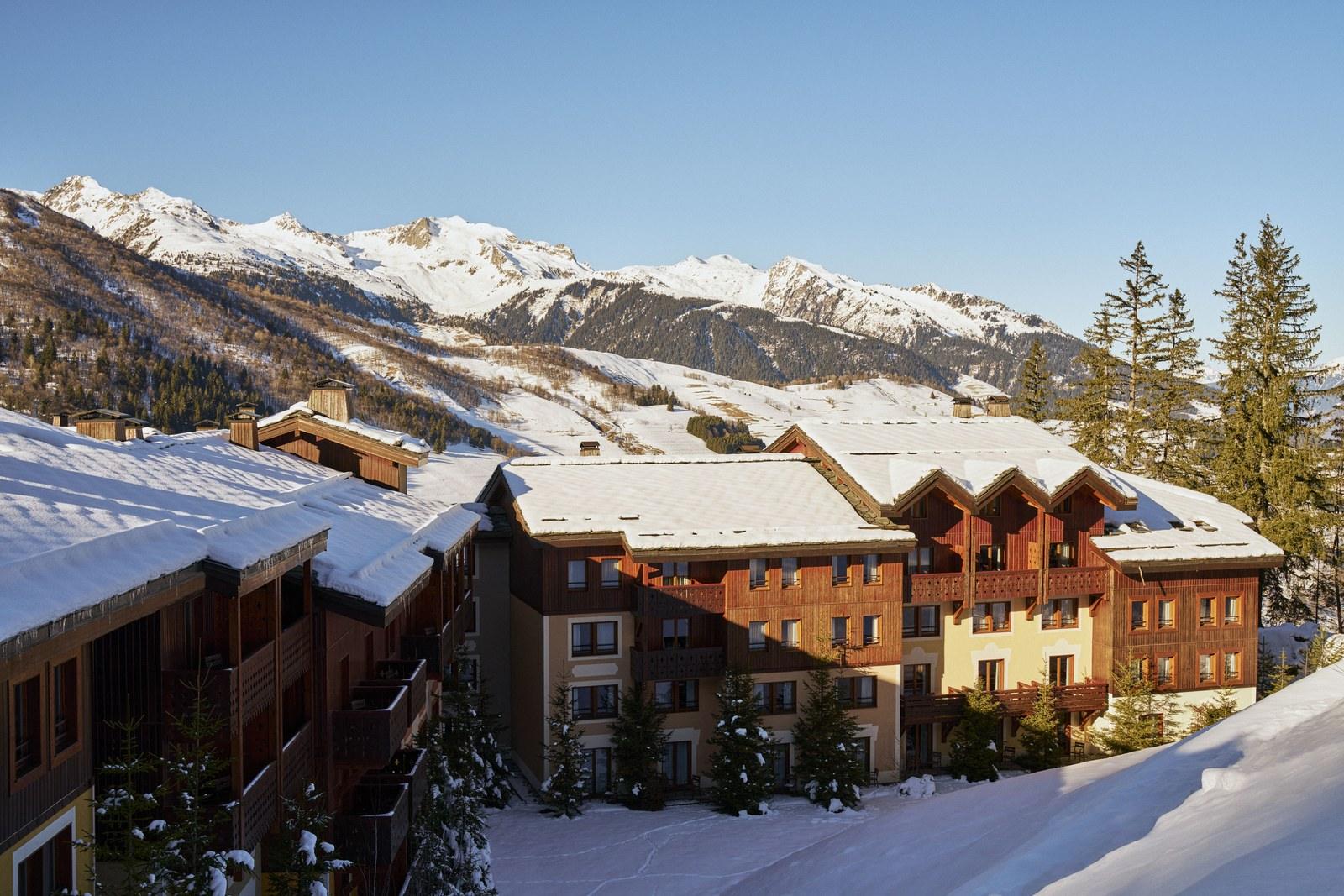Club Med Valmorel buildings surrounded by snowy mountains
