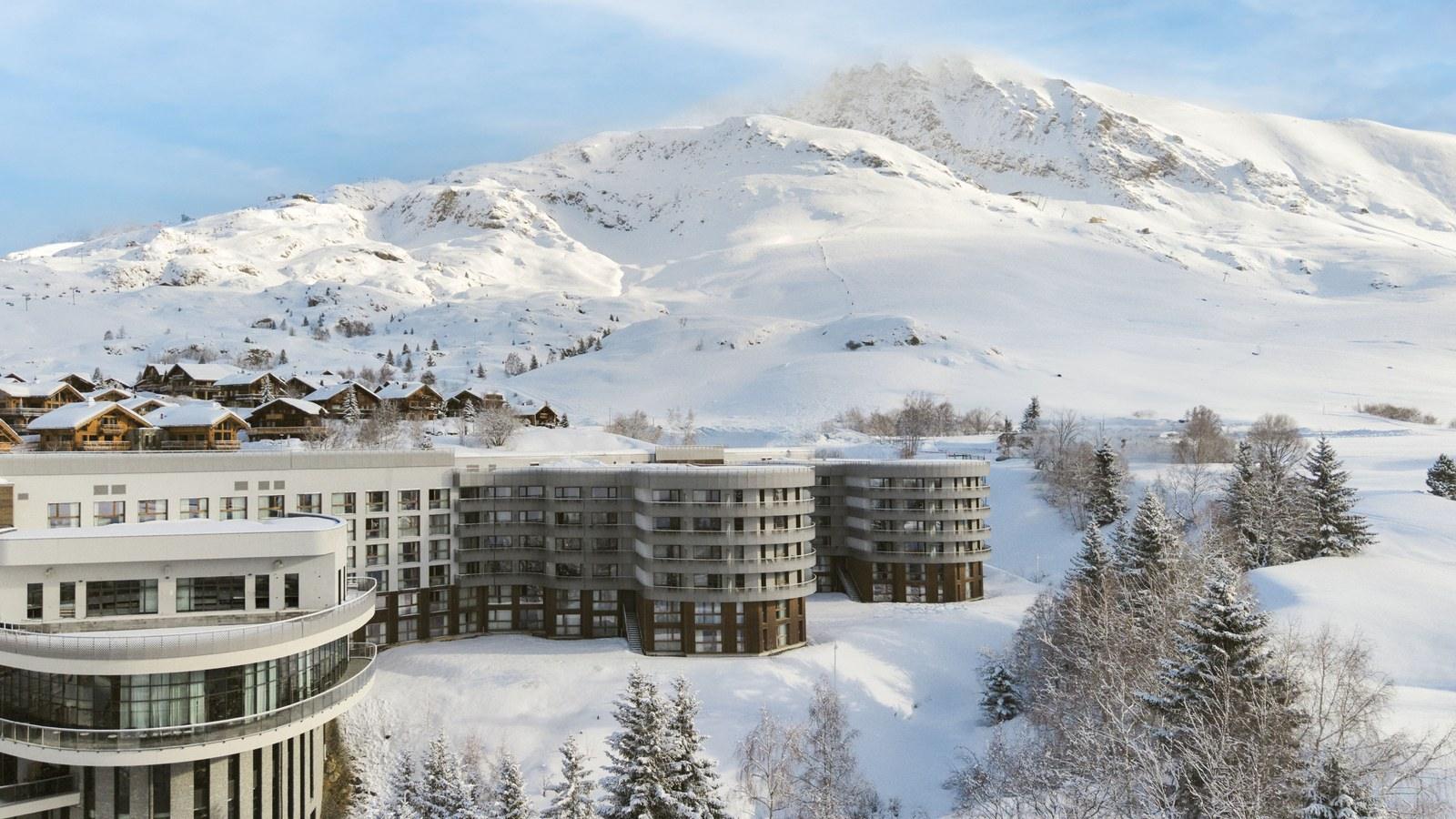 Club Med Alpe d’Huez surrounded by snow-covered mountains