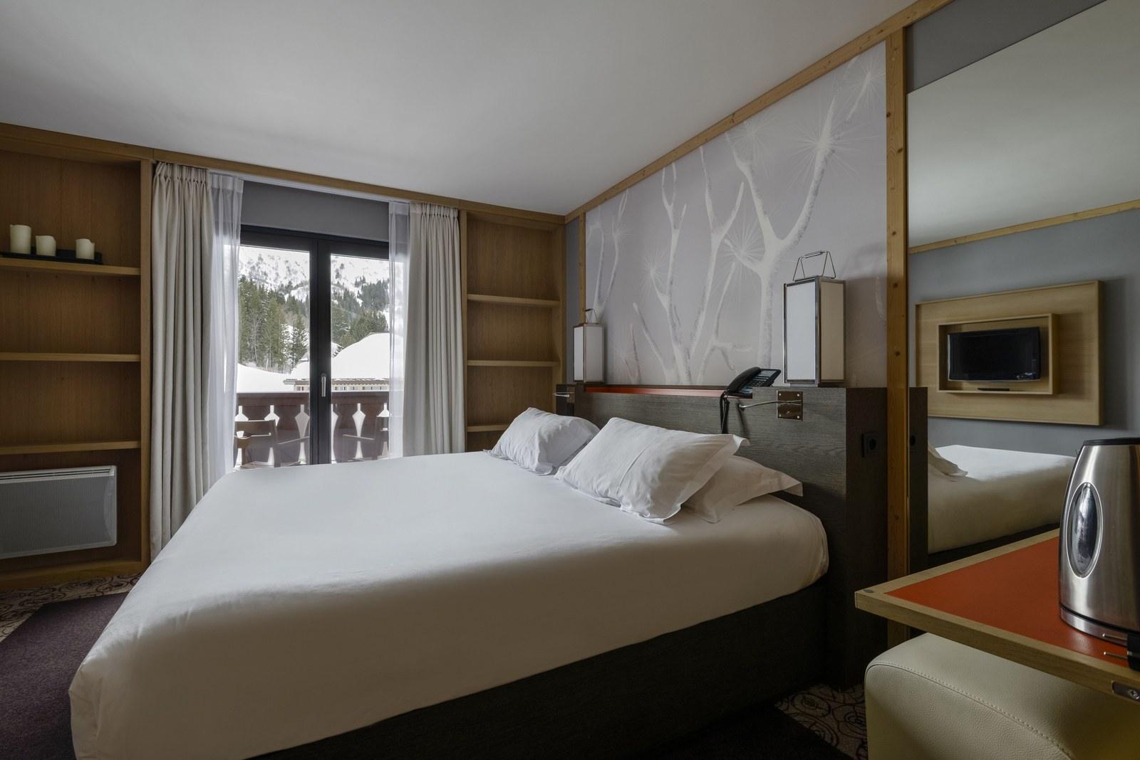 Room at Club Med Valmorel with a snowy mountain view